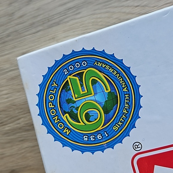 Monopoly 65th Anniversary Game with Winning Token Piece Like New - Picture 2 of 11